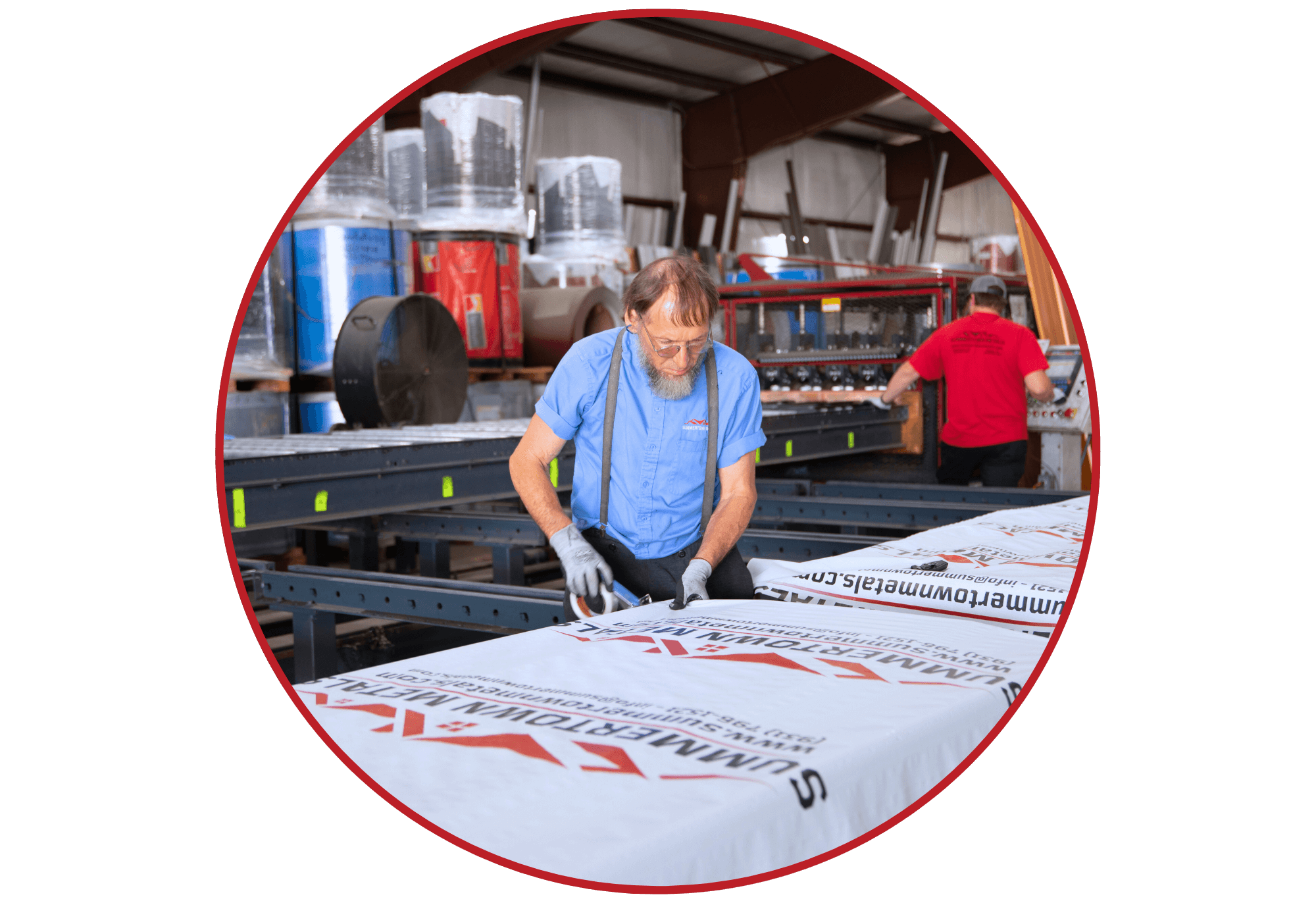 team member preparing house wraps